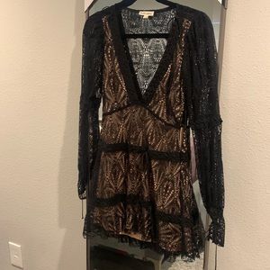 Gorgeous black lace sheer cocktail dress.